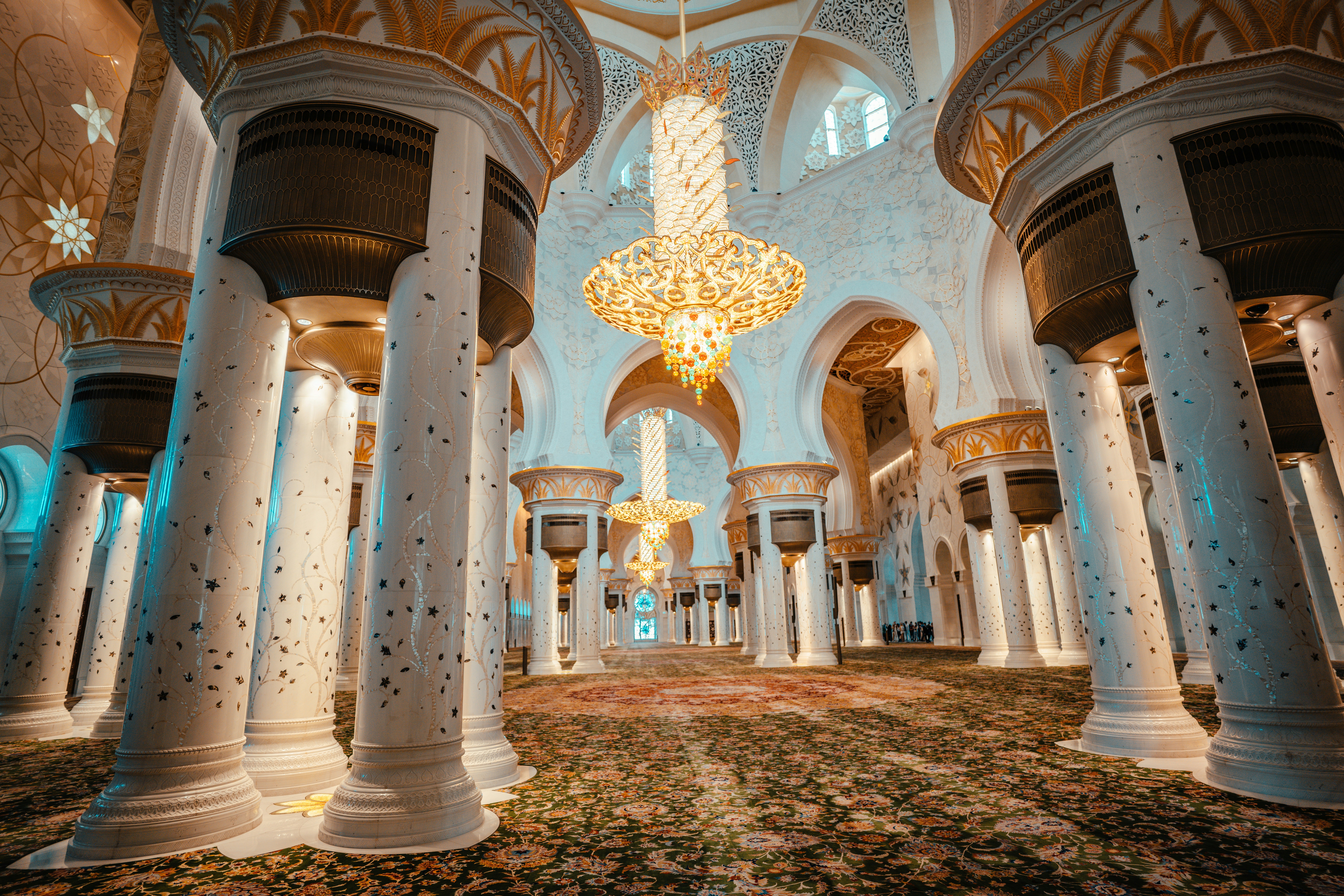 great photo recipe,how to photograph abu dhabi grand mosque or sheikh zayed grand mosque the largest mosque in the country, it is the key place of worship for daily, friday and eid prayers. popular tourist spot; the interior of a building with columns and chandeliers