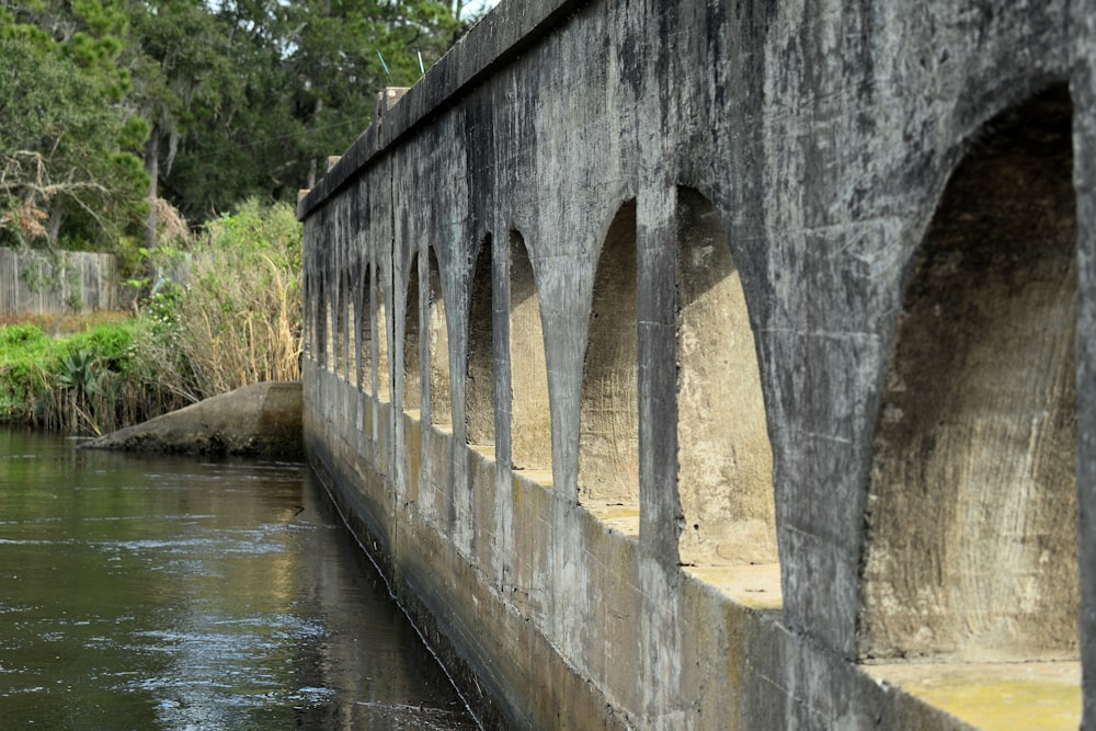 a stone bridge over a body of water