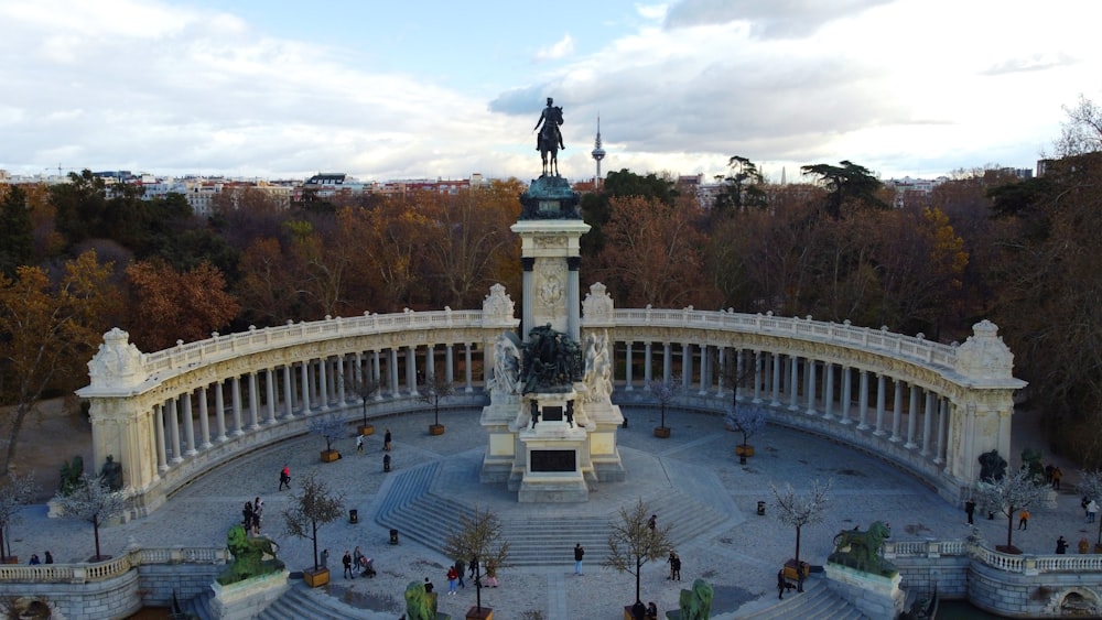 an aerial view of a statue in a park