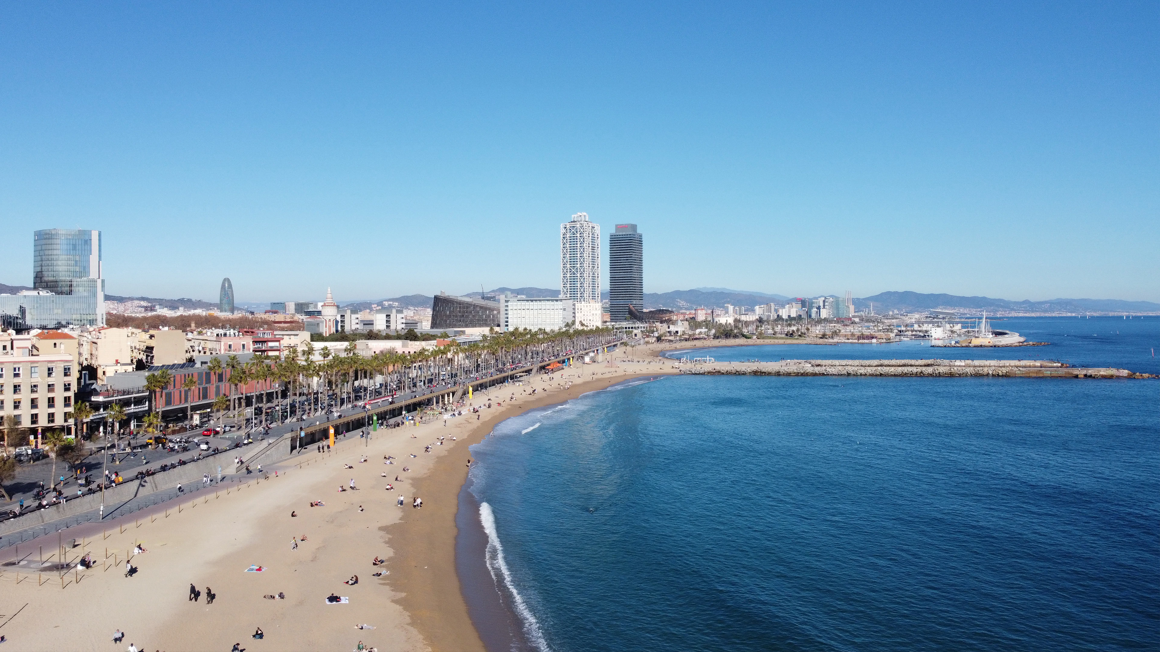 Barcelona's beach and seafront on a clear day