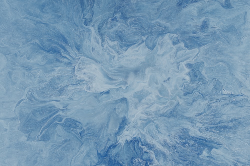 a blue and white marble textured background