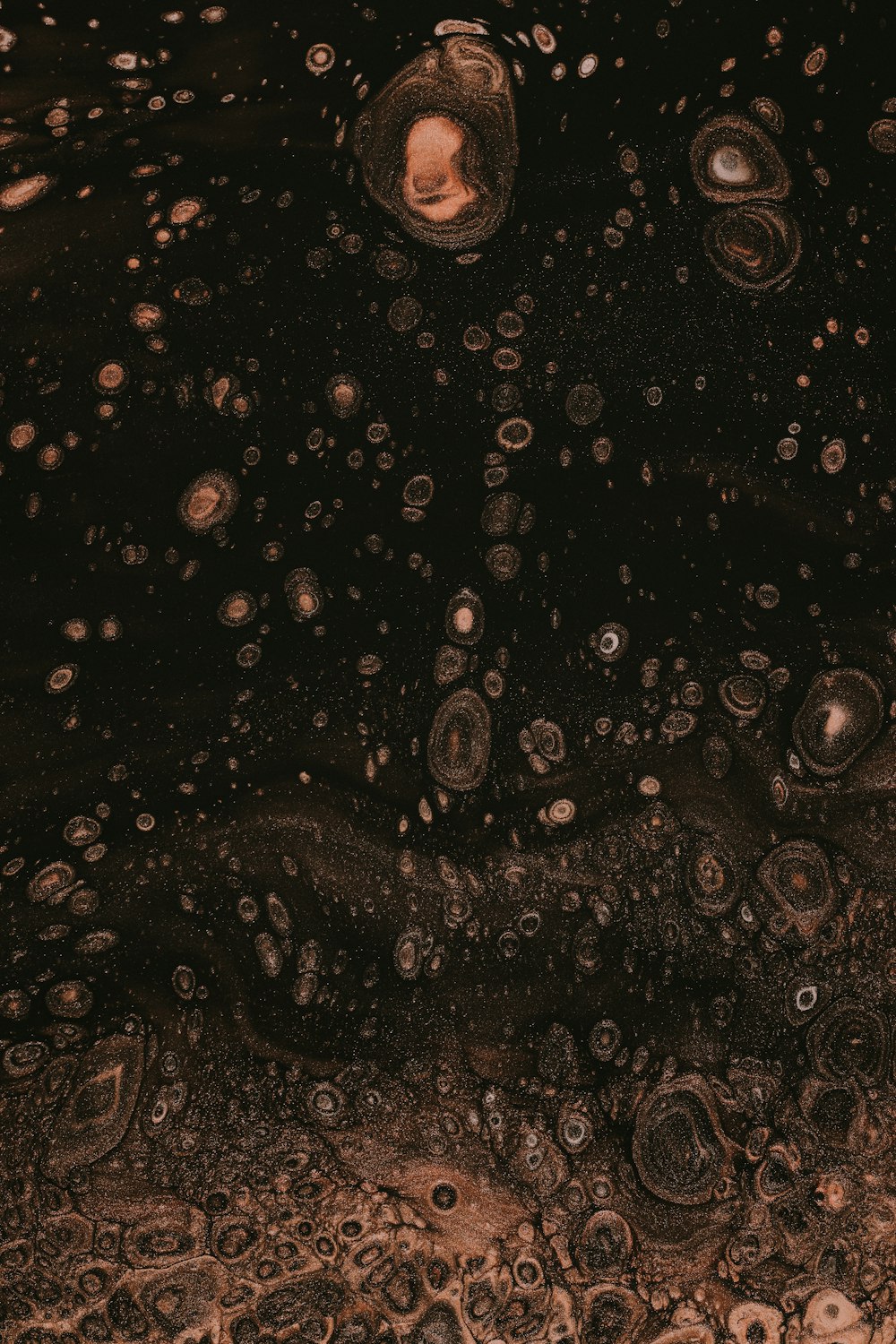 a close up of water bubbles on a surface