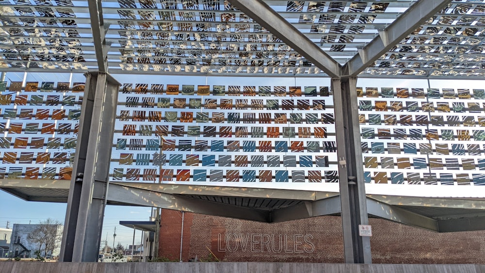 a large metal structure with a lot of pictures on it
