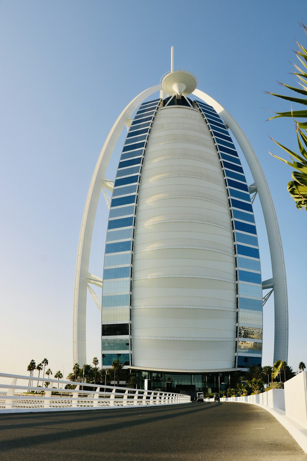 a very tall building with a curved roof