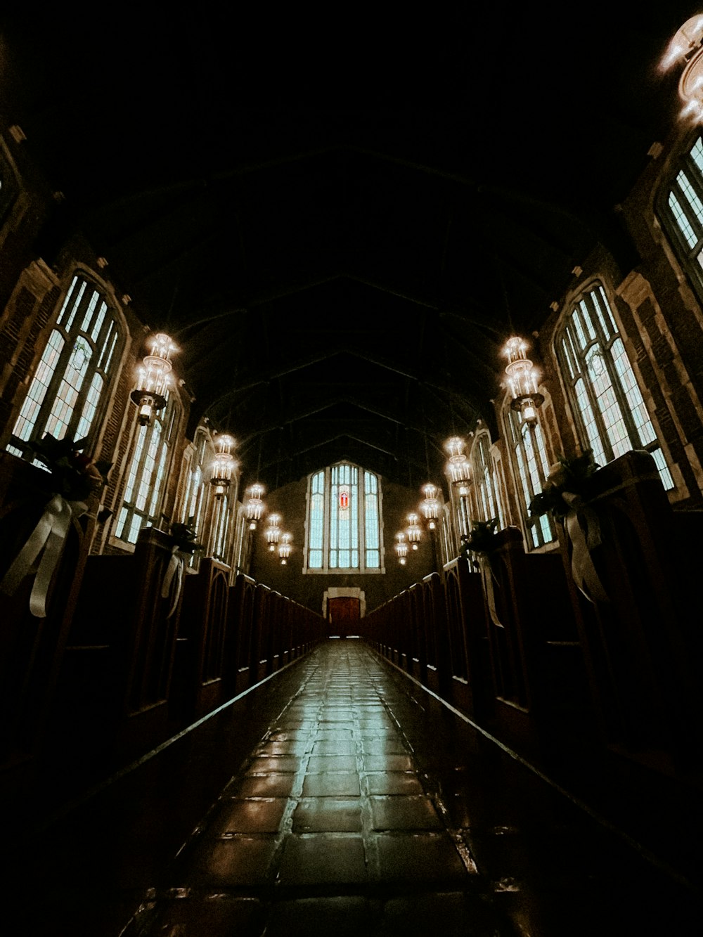 a dimly lit hallway in a train station