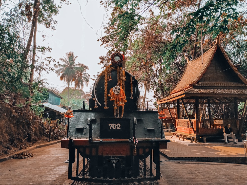 a statue of a man riding on top of a train