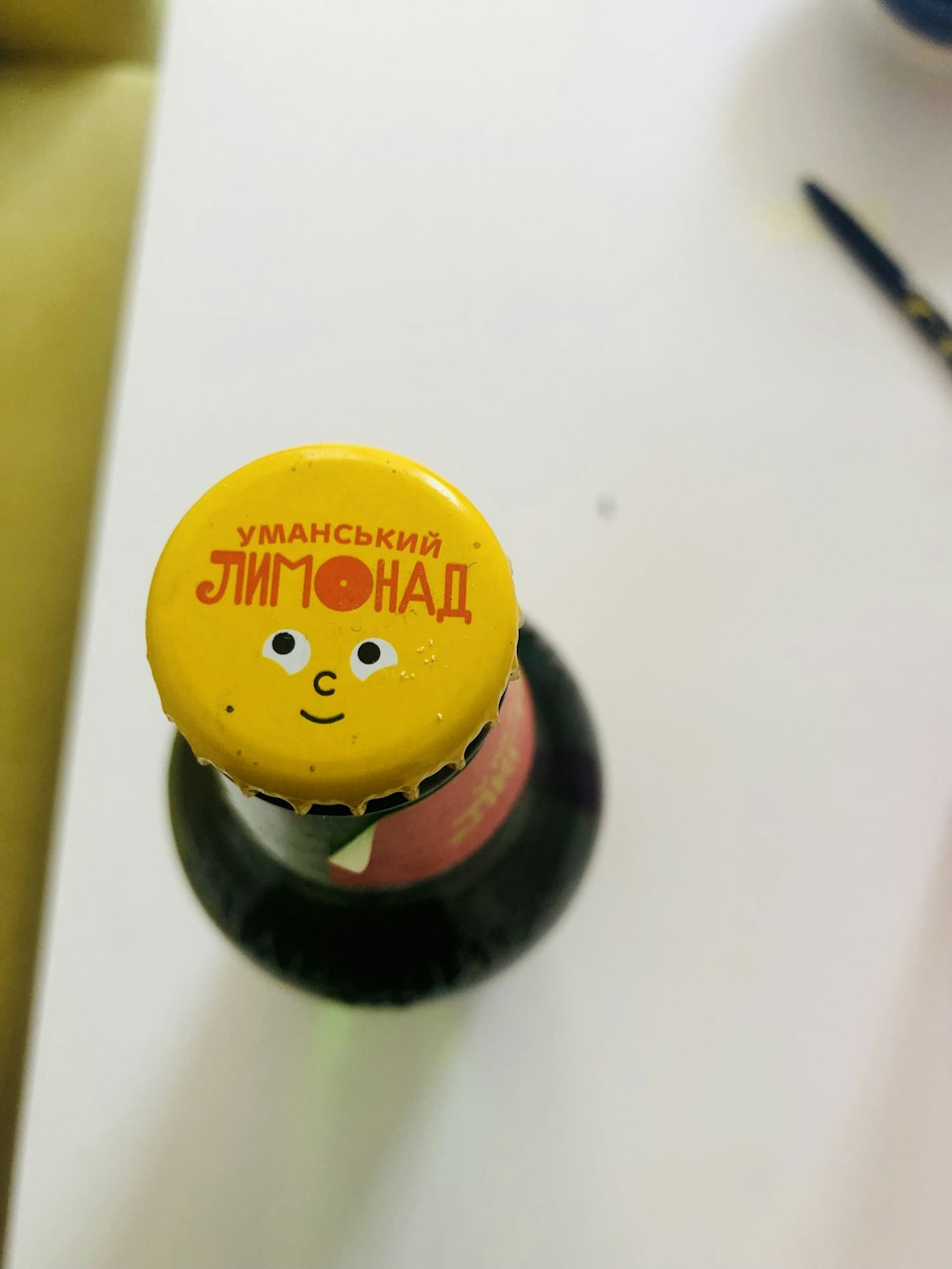 a bottle of wine with a face on it