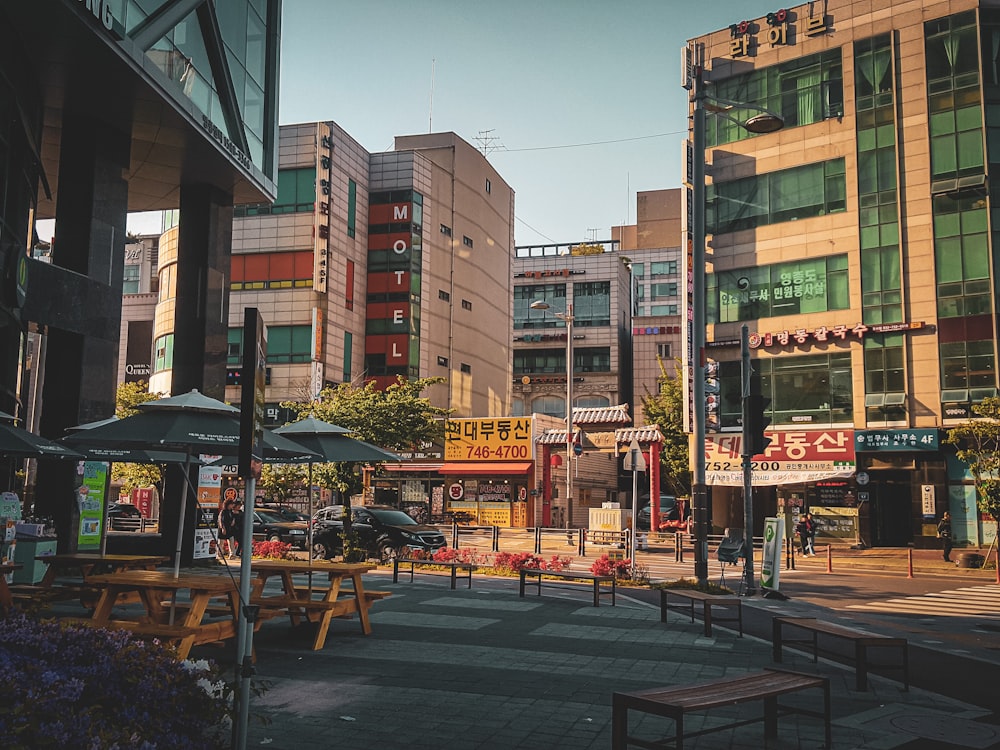 a city street with a lot of tall buildings