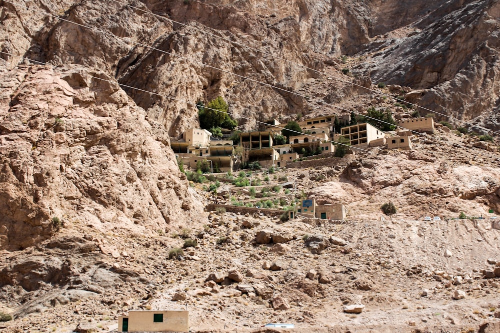a group of houses built into the side of a mountain
