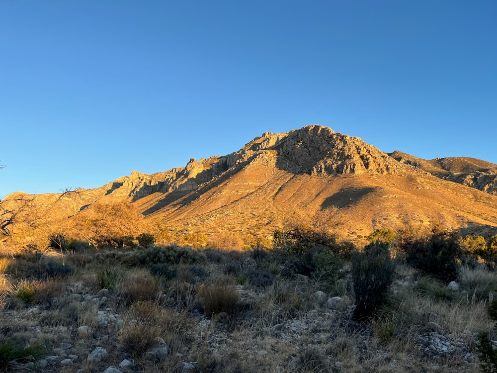 a view of a mountain range in the desert