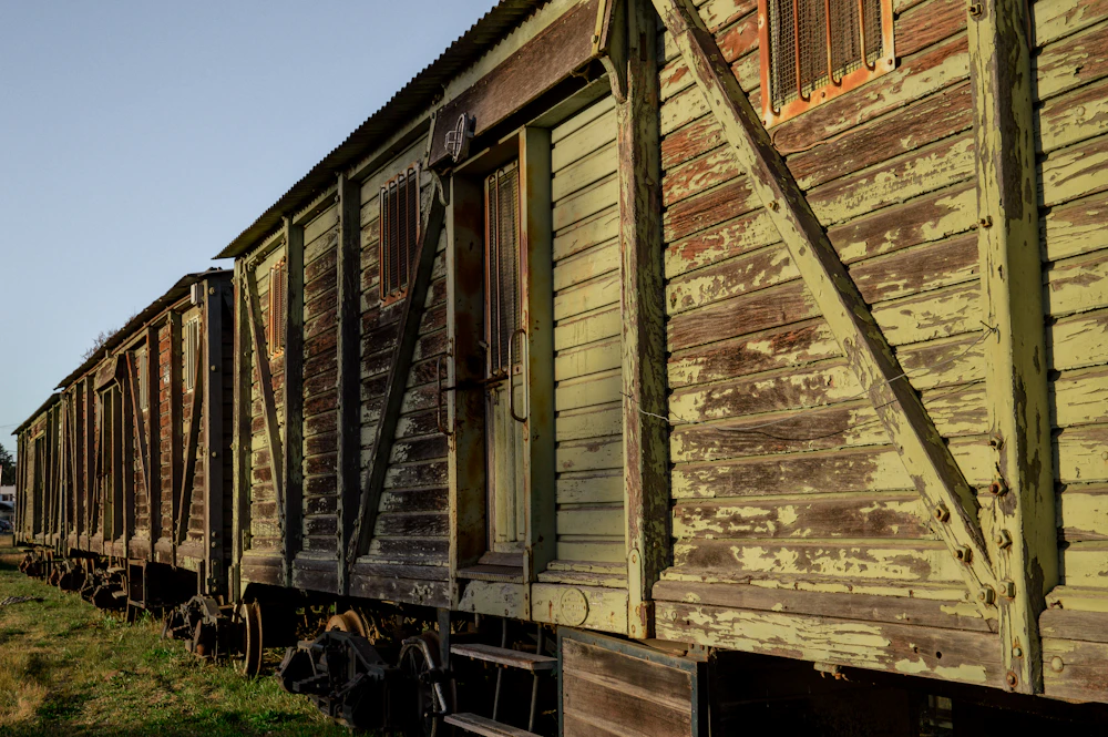 An old railway carriage standing on the tracks