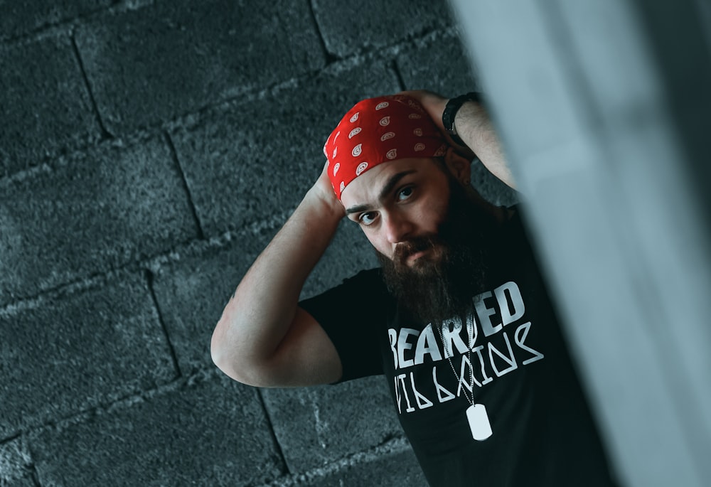 a man with a red bandana on his head