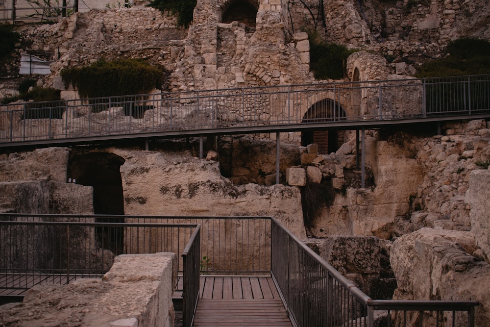 a stairway leading up to a cave like structure