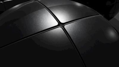 Close-up of a sleek white aluminum board with a smooth surface and subtle reflections.