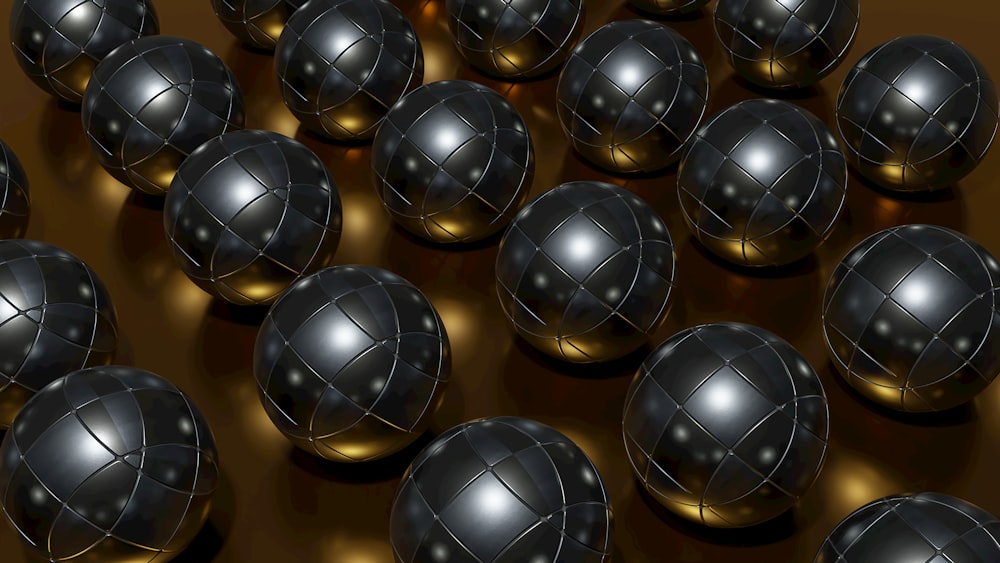 a bunch of metallic balls sitting on top of a table