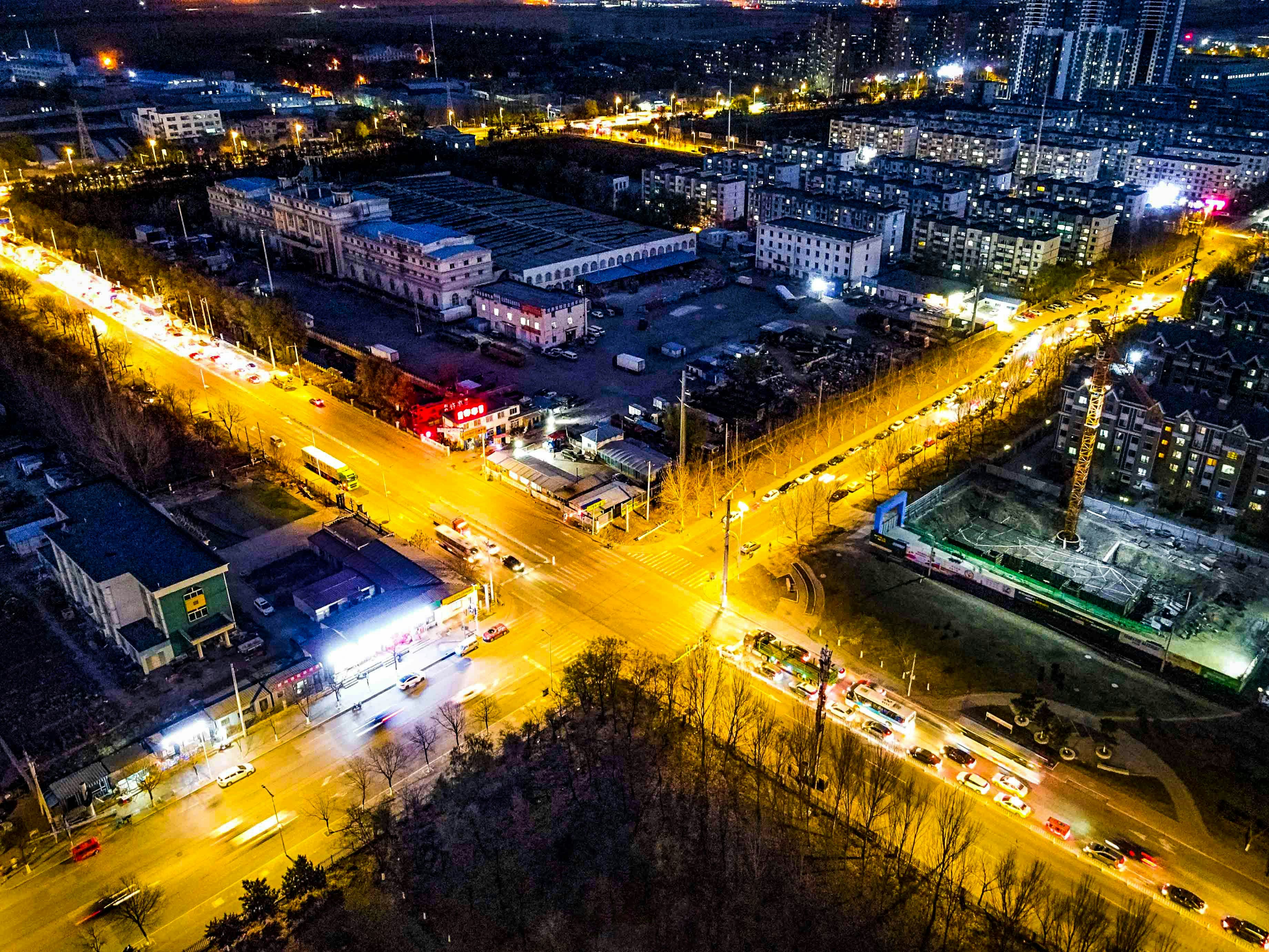 an aerial view of a city at night