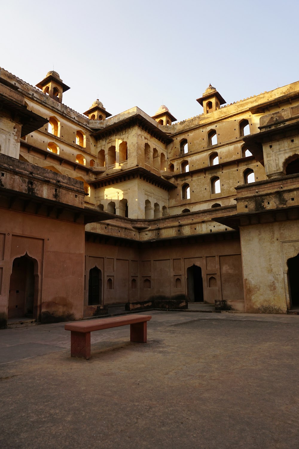 a building with a bench in the middle of it