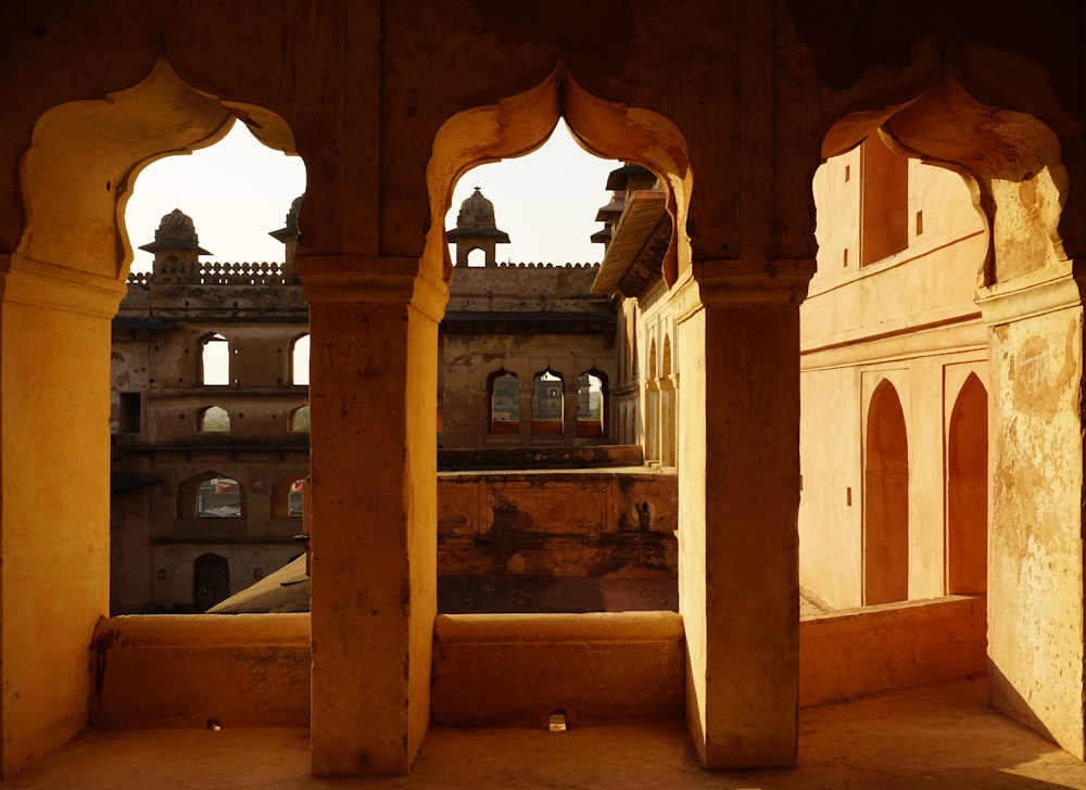 a view of a building through two archways