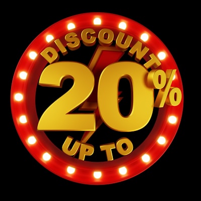 Large, bold text displaying 'Discount 20%' surrounded by a circular border of bright lights, set against a dark background. The text is prominently featured in gold and red colors, creating an eye-catching effect.