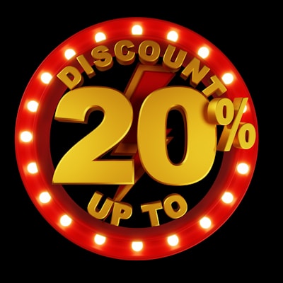 Large, bold text displaying 'Discount 20%' surrounded by a circular border of bright lights, set against a dark background. The text is prominently featured in gold and red colors, creating an eye-catching effect.
