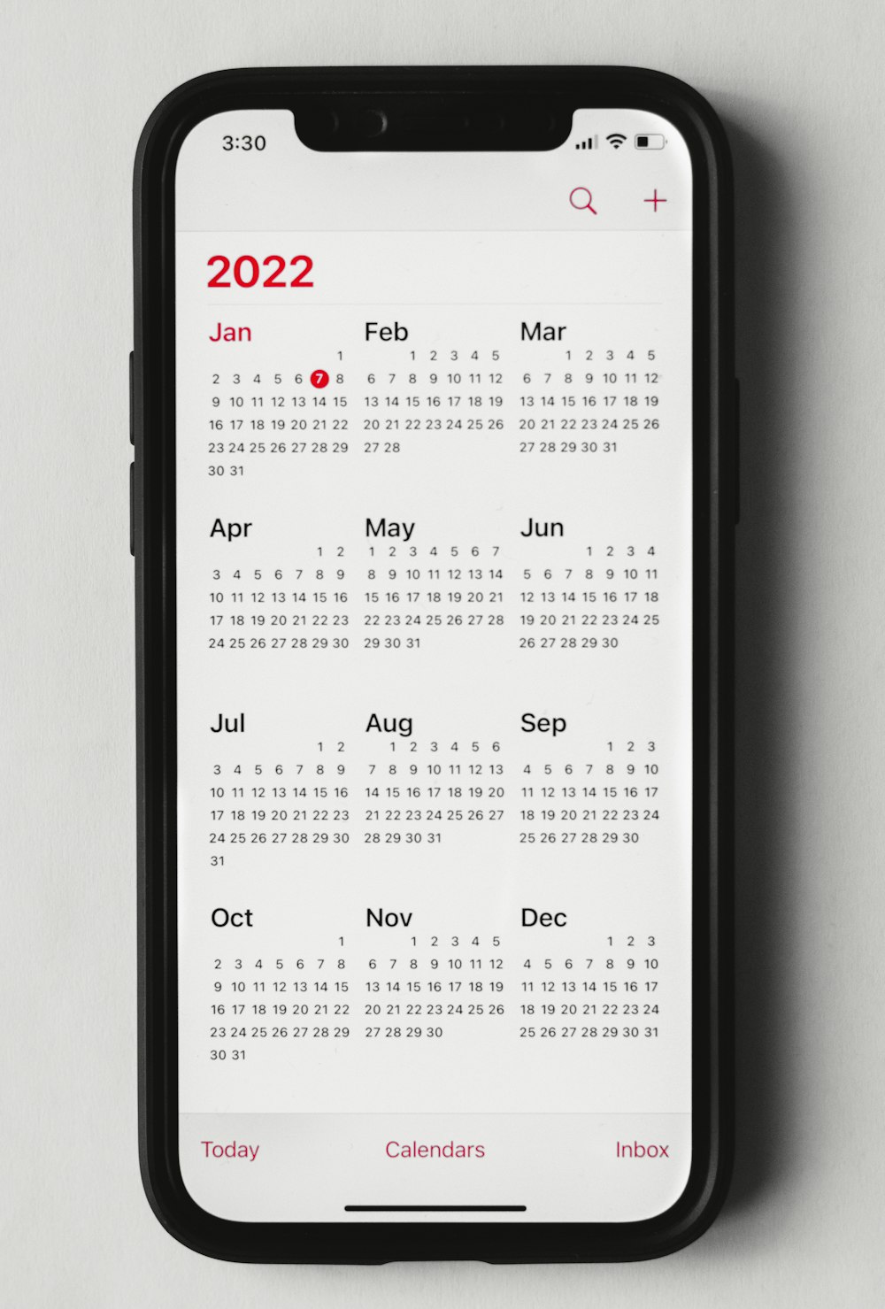 a phone with a calendar on the screen