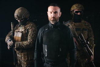 a group of men in military gear standing next to each other