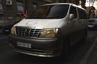 a van parked on the side of the road