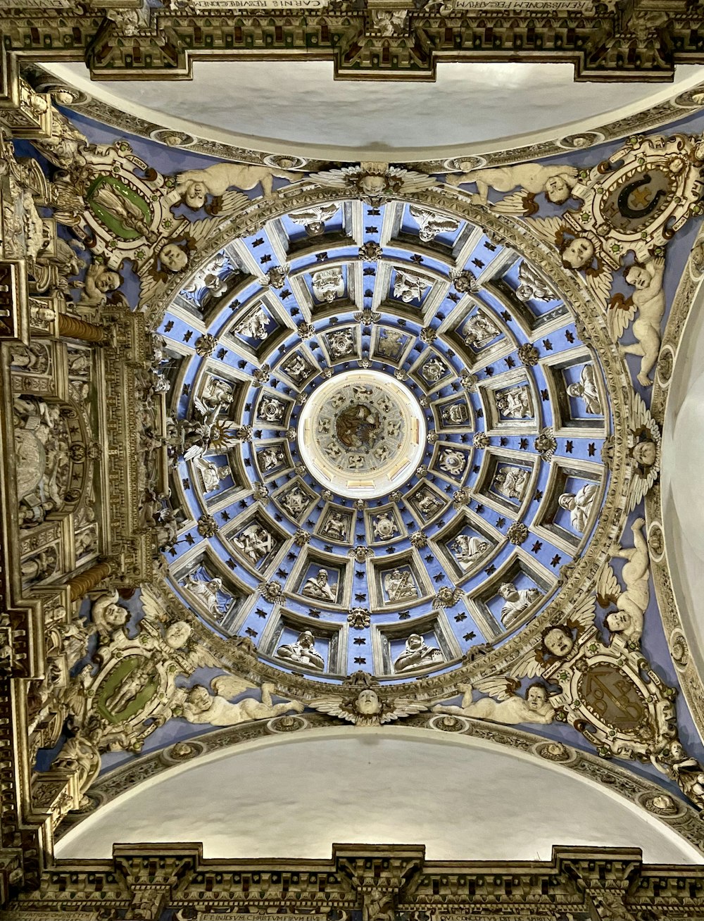 the ceiling of a building with a circular design