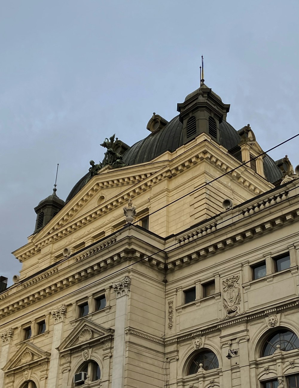 a large building with a clock on the top of it