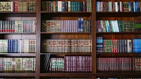 a book shelf filled with lots of books
