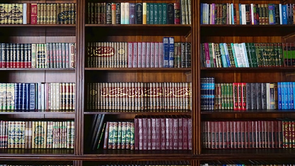 a book shelf filled with lots of books