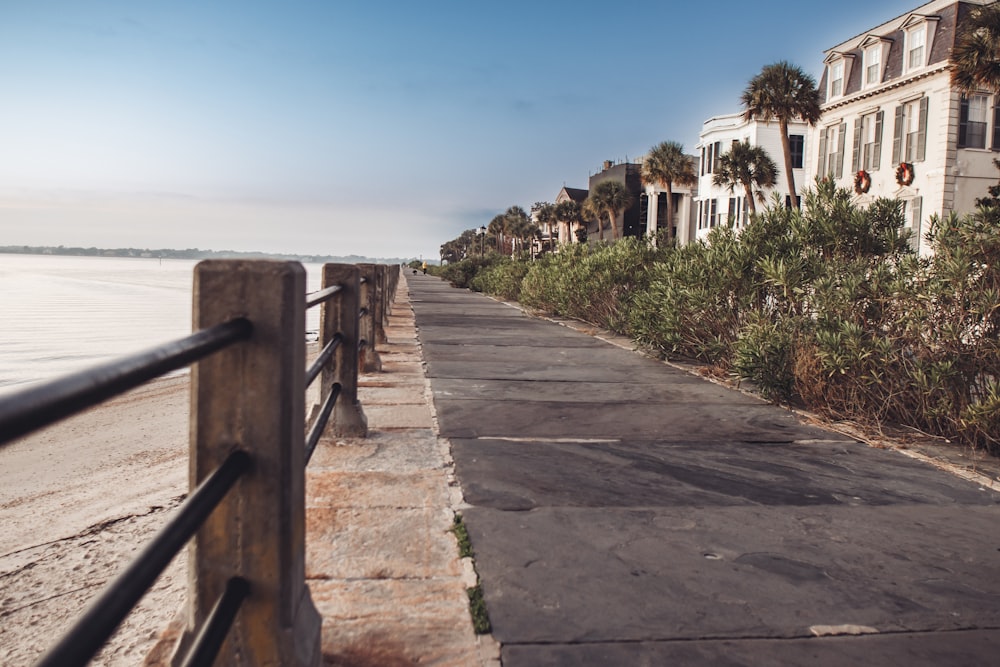 a row of houses next to a body of water