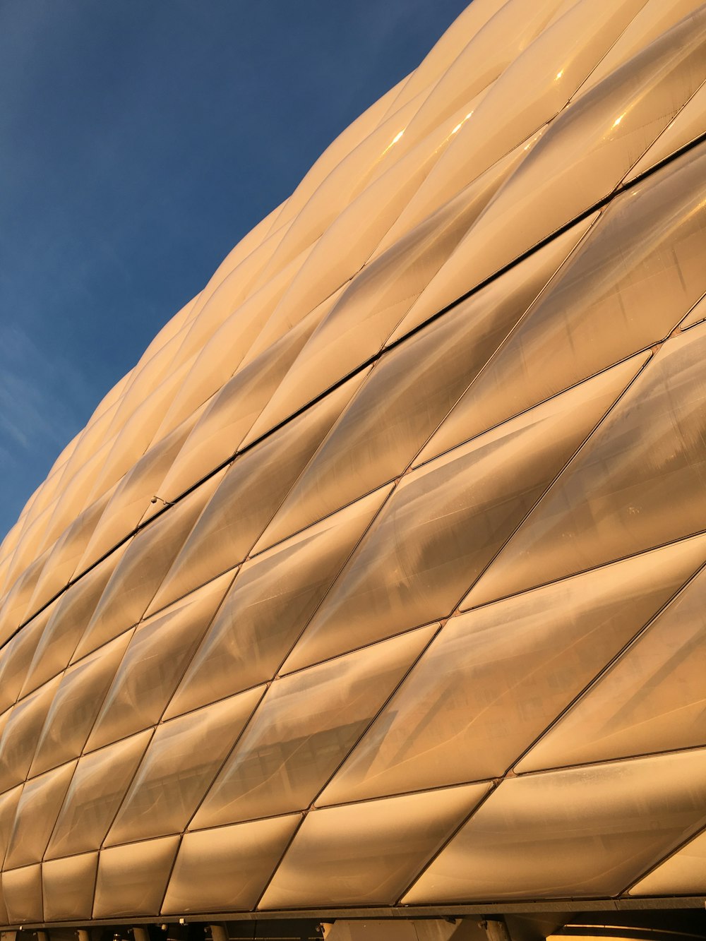 a close up of a building with a blue sky in the background