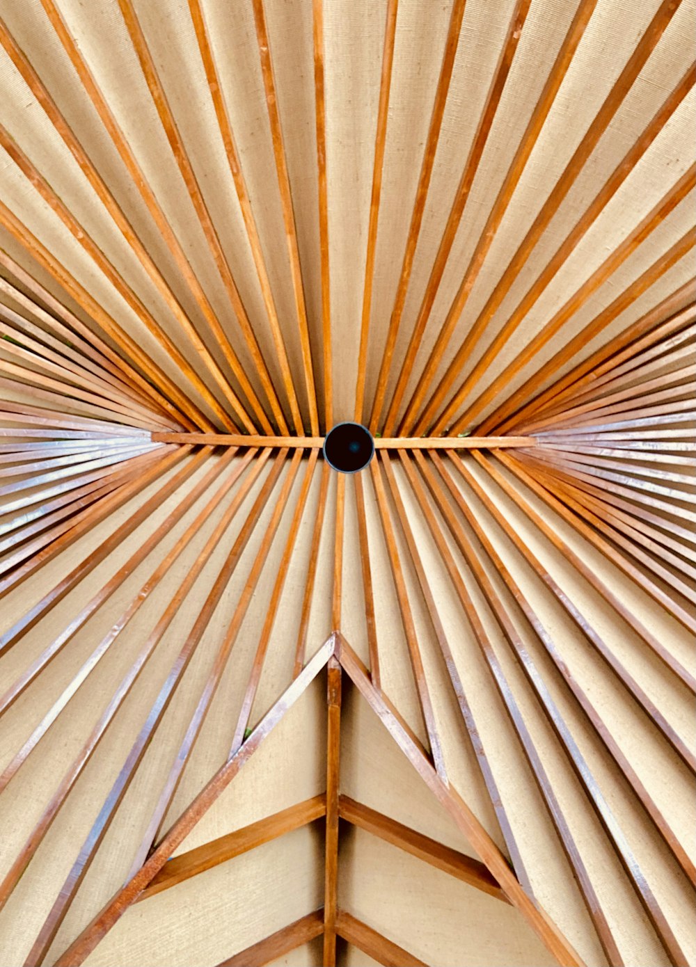 a close up of a ceiling made of wood