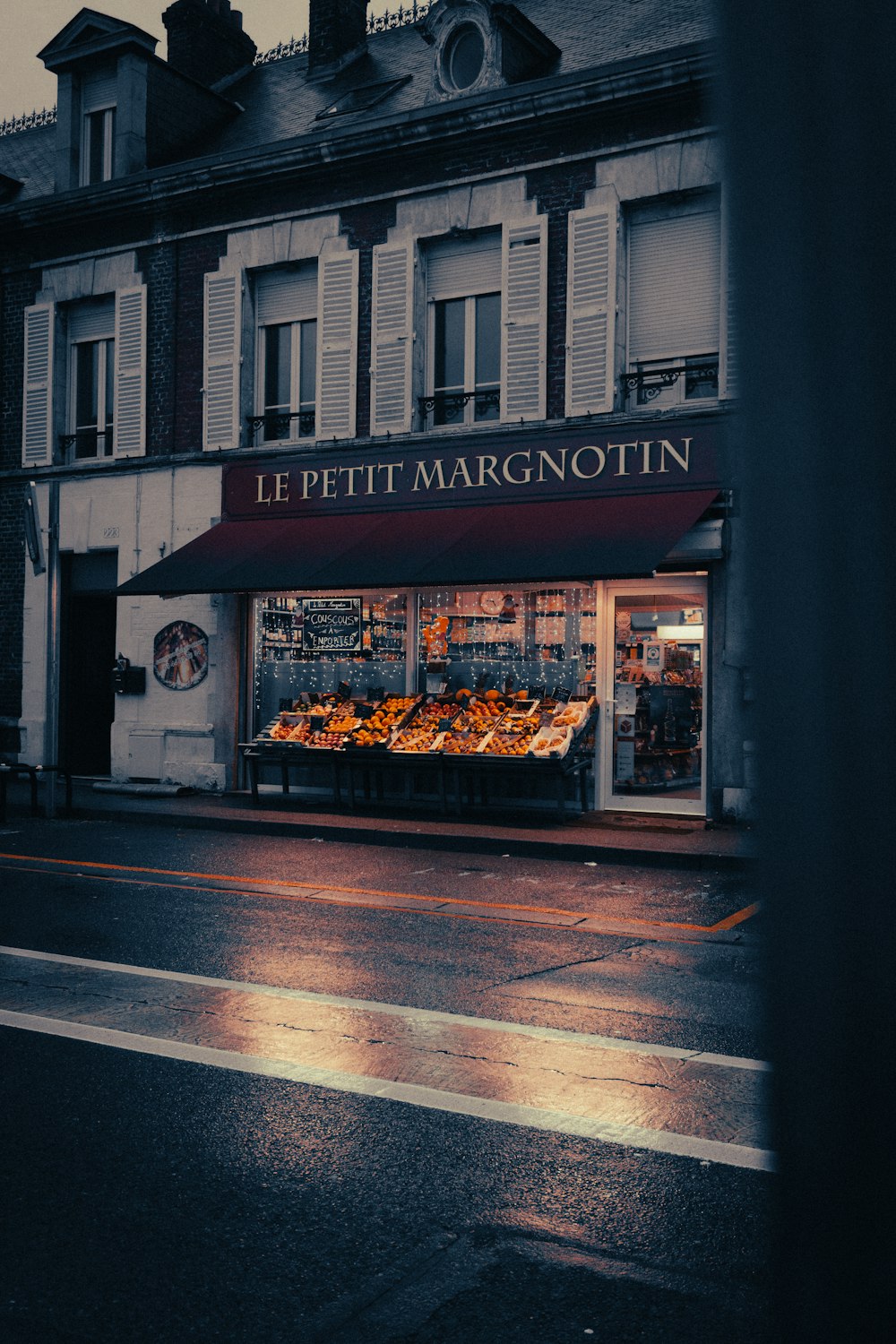 a street corner with a store on the corner