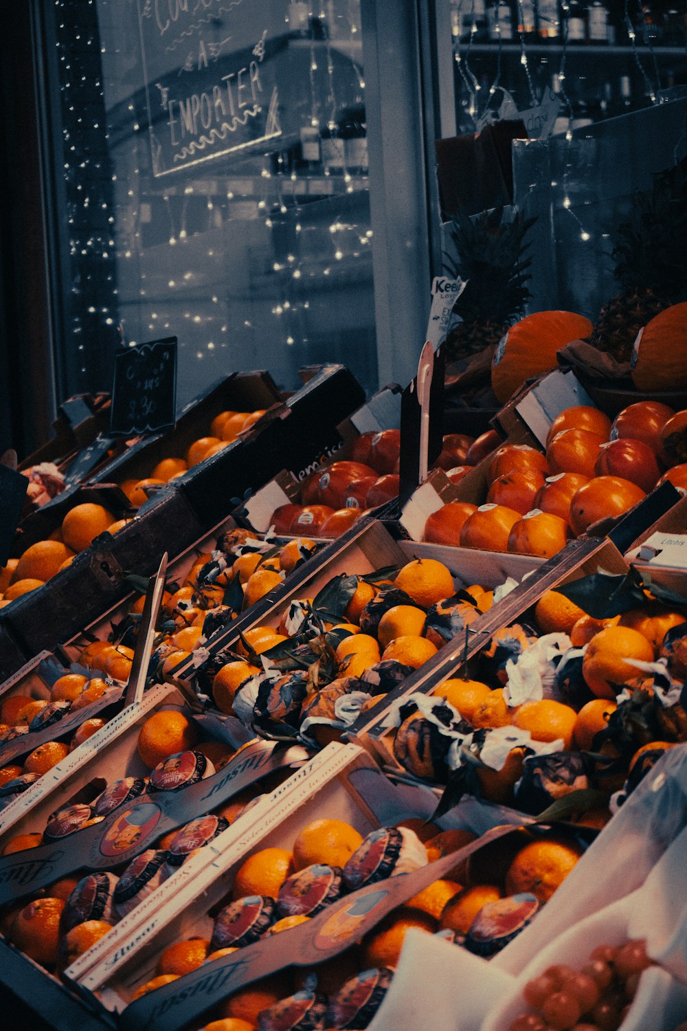 a display of oranges in a store window