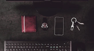 Modern office desk with insurance documents and car keys