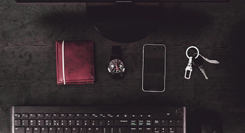 Modern office desk with insurance documents and car keys