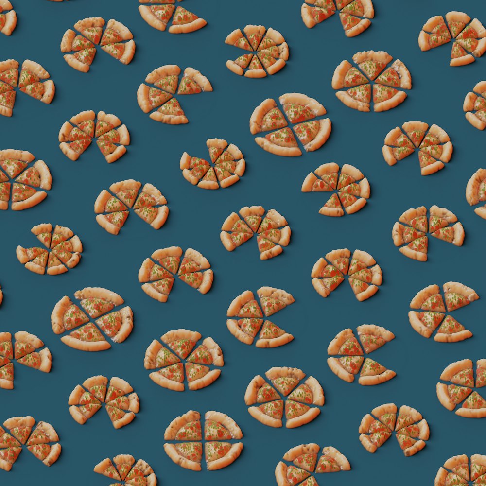 a pattern of pizza slices on a blue background