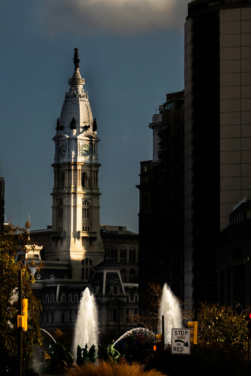 a large clock tower towering over a city