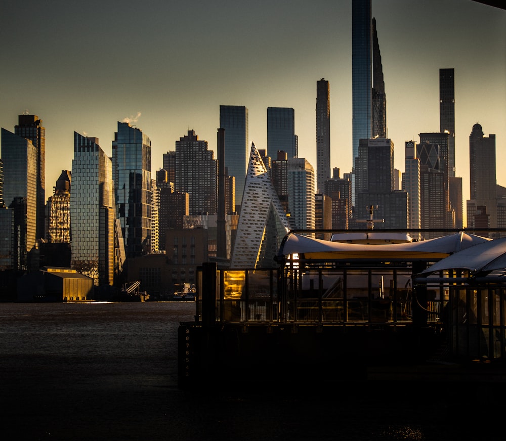 a view of a city skyline with skyscrapers in the background