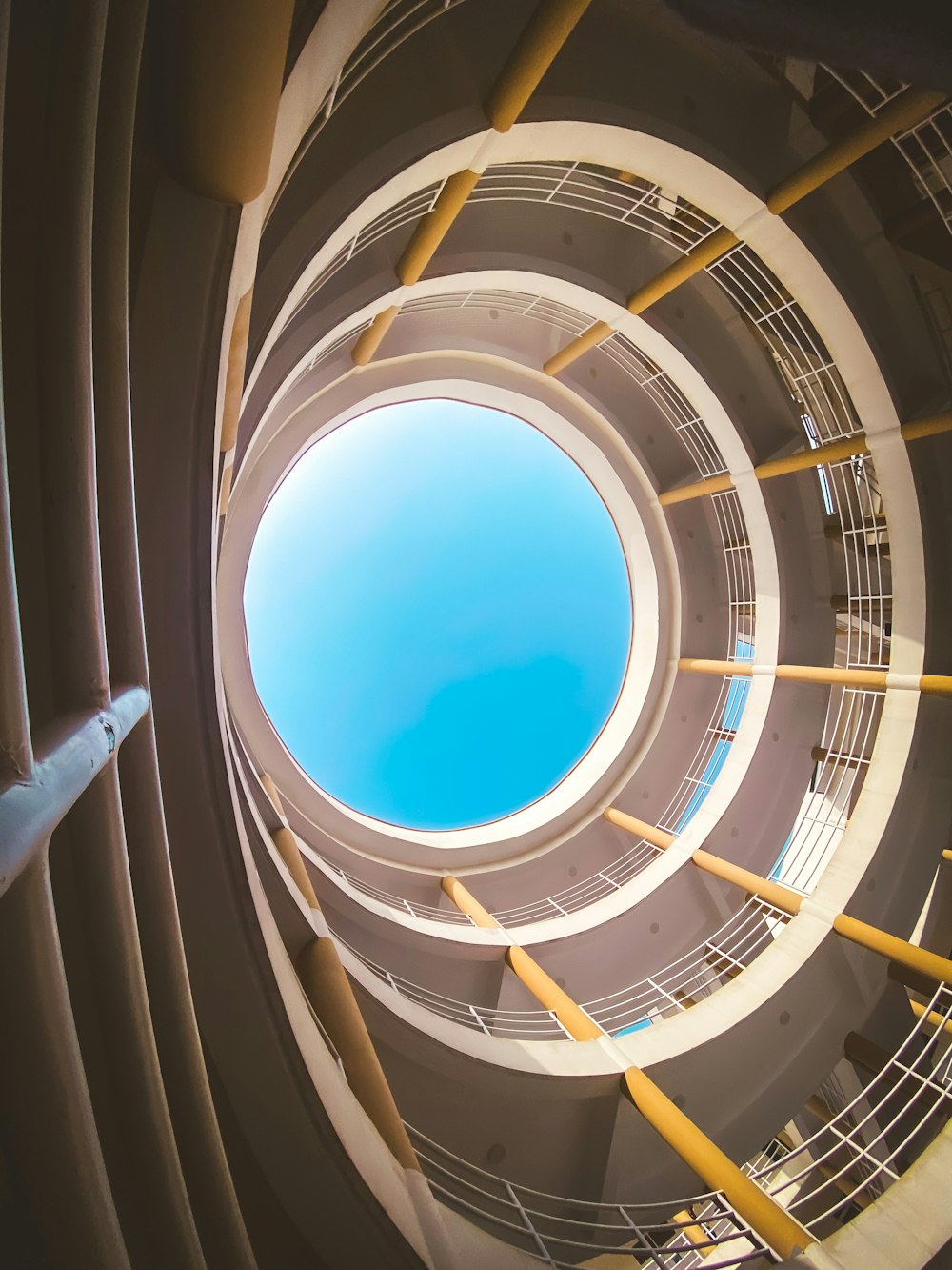 a view of the inside of a building looking up at the sky