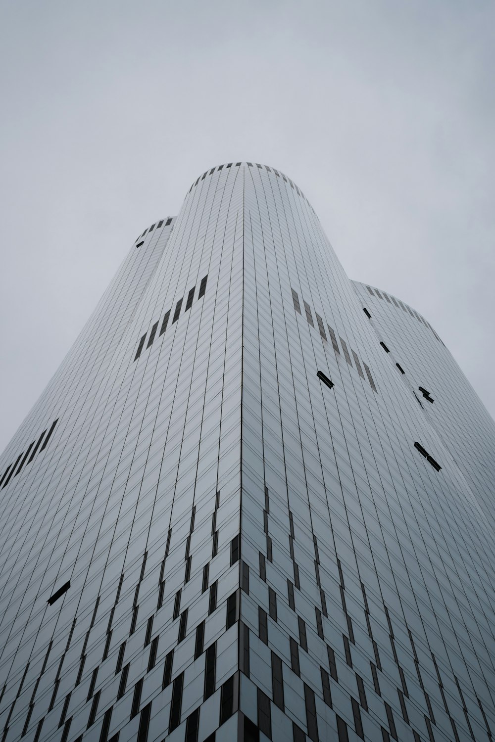 a bird flying over a building