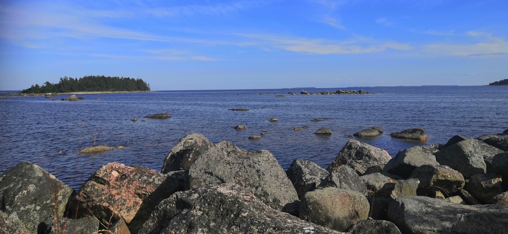 a large body of water surrounded by rocks