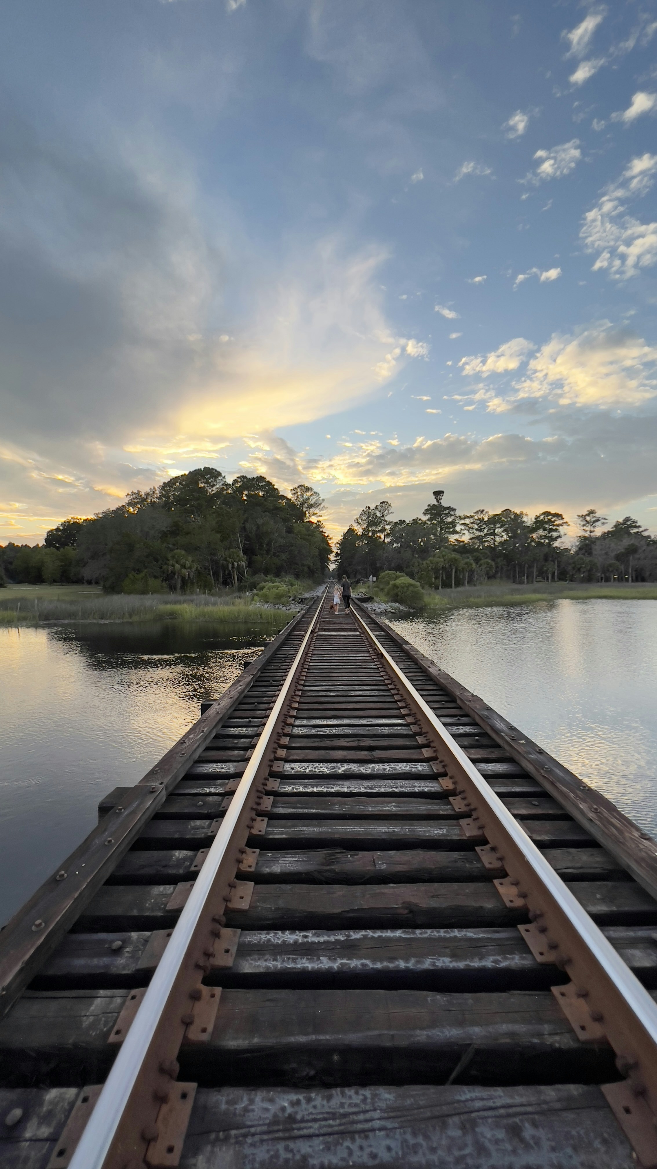 a train track going across a body of water