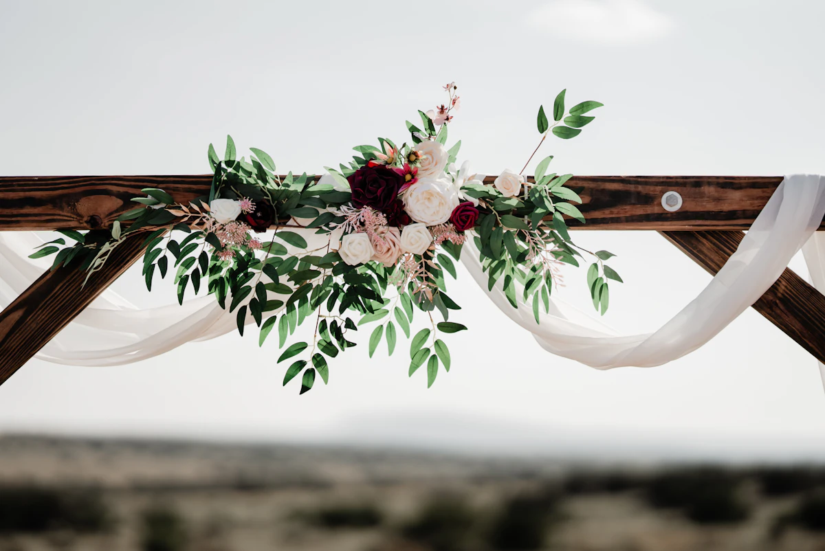 Style inspiration: wedding arch styled with flowers and greenery