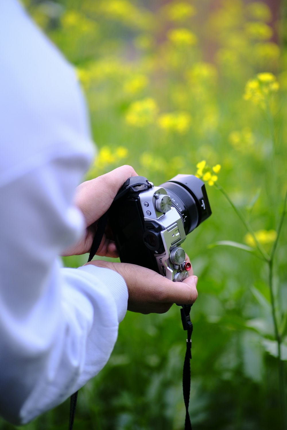 a person holding a camera in their hand