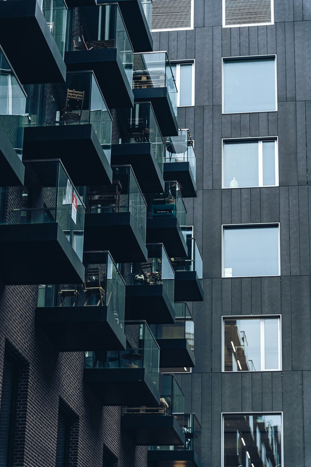 a tall building with balconies and balconies on it