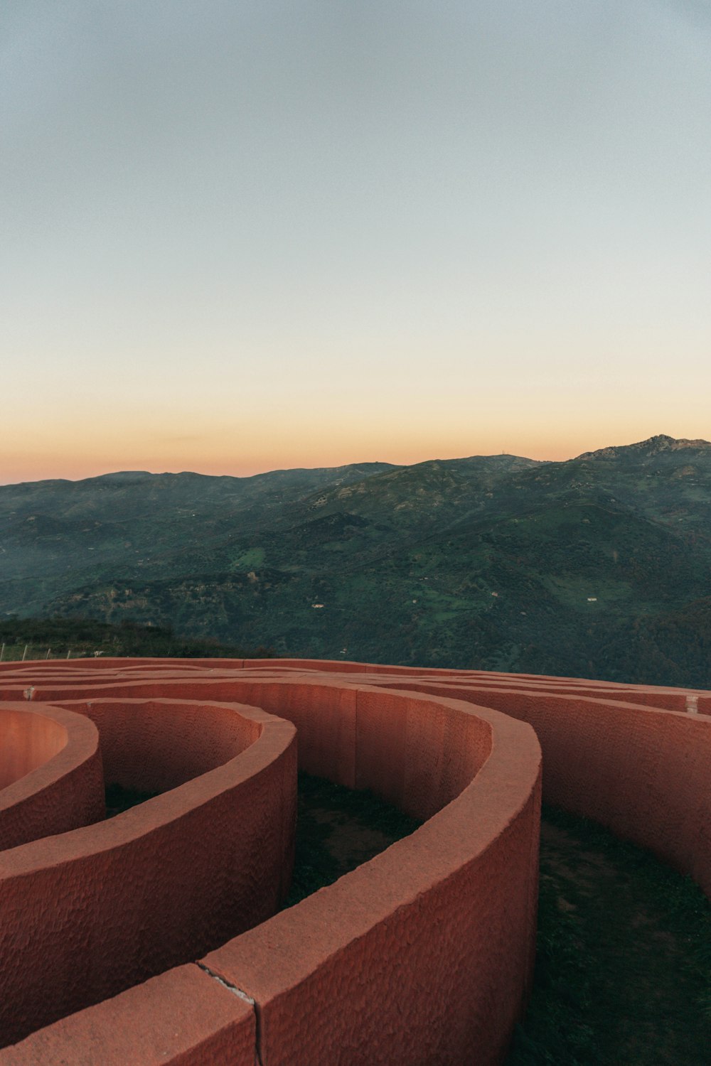 a view of the mountains from the top of a building