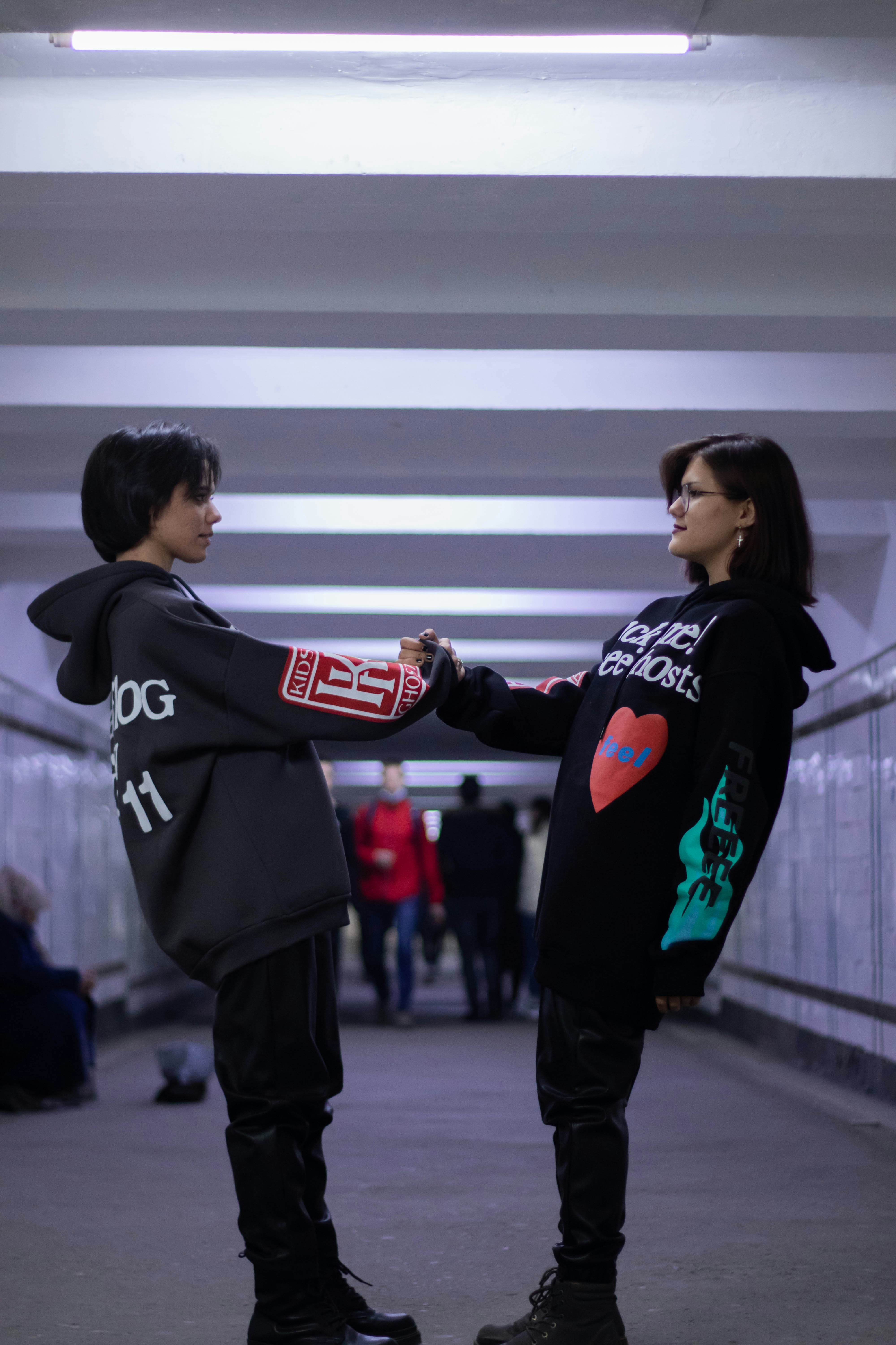 a couple of people standing next to each other